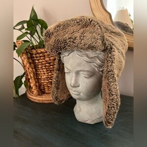 Dorfman Pacific Co Trapper hat with ear flaps.